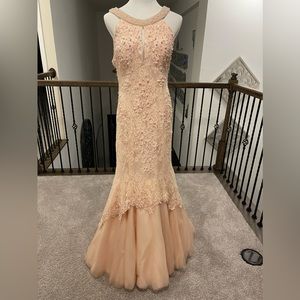 Pastel pink dress, looks a bit peach in the lighting .